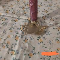 porta candela in ottone a forma di stella 