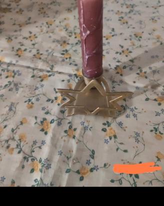 porta candela in ottone a forma di stella 