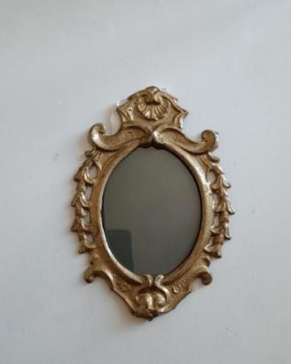 Cornice in ottone antica