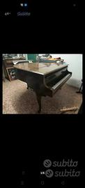 pianoforte un quarto di coda 