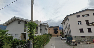Bilocale Colico con Posto Auto e Giardino