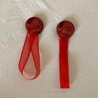 Coppia di fermatende a calamita rossi