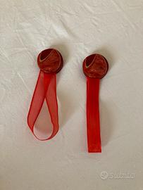 Coppia di fermatende a calamita rossi