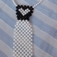 Cravatta di perline