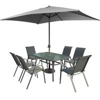 Tavolo in vetro con 6 sedie e ombrellone