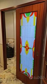 Porta a scrigno con vetro