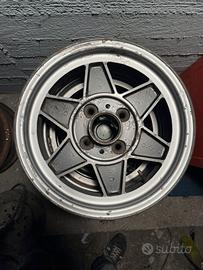 Cerchi in lega 13” x 5.5” 5 razze 4x98 vintage