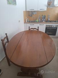 Tavolo ovale con lati pieghevoli e 6 seggiole