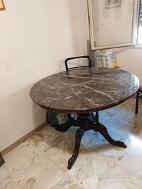 Tavolo rotondo in marmo piede in legno massiccio