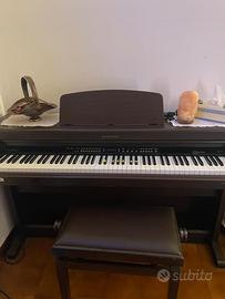 Pianoforte digitale con sgabello imbottito