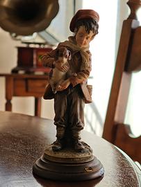 Statua Capodimonte bambino con cane