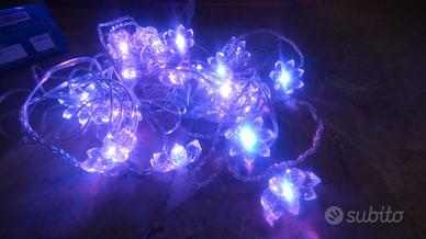 Luci natalizie catenaria 20 fiori led iridescenti