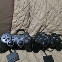 PS2 con 4 giochi e 2 joystick funzionanti