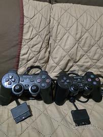 PS2 con 4 giochi e 2 joystick funzionanti