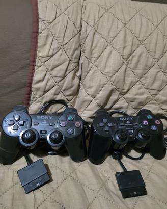 PS2 con 4 giochi e 2 joystick funzionanti