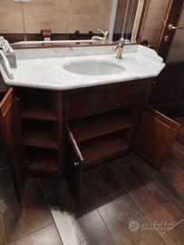 bagno in arte povera con piano in marmo 