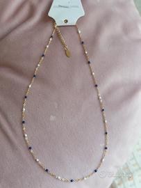 collana, orecchini, orologio 