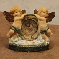 Orologio con Putti in Resina Design