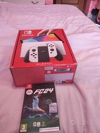 NINTENDO SWITCH OLED 64 GB + FIFA 24