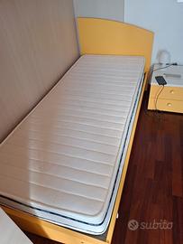Letto singolo e comodino