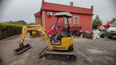 Escavatore new Holland 18ql