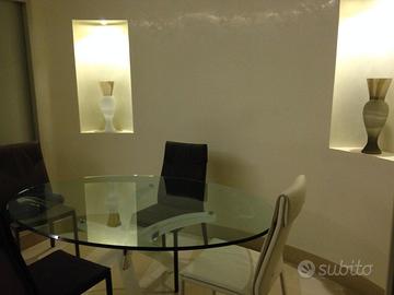 tavolo ovale in  cristallo reflex 