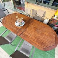 tavolo e sedie da esterno in teak e alluminio