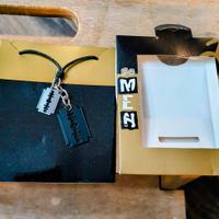 collana in cuoio con ciondolo con doppia lametta 