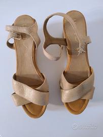 Sandali Unisa oro con tacco