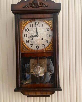 Orologio a pendolo funzionante