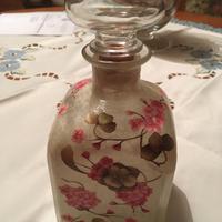 Bottiglia rivestita in decupag