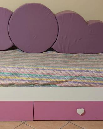 Letto singolo con  cuscini spalliera
