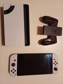 Nintendo switch + 4 giochi + sd card + custodia