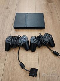 Play Station 2 con 11 giochi + supporto EyeToy