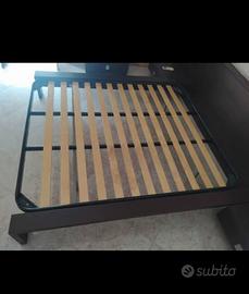 Rete a doghe in legno