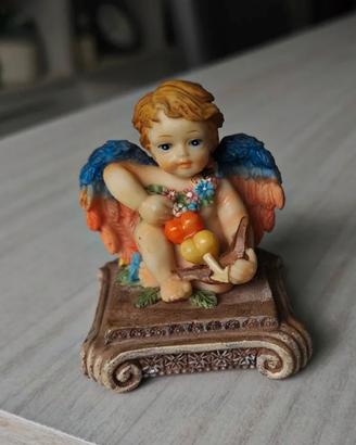 Piccolo Cupido in resina. Vintage.