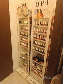 Espositore OPI con gel color e smalti