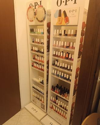 Espositore OPI con gel color e smalti