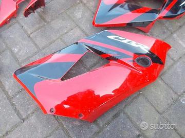 X CBR 125 07-10: parafango sella vetro