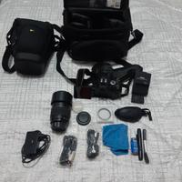 nikon D5100 con accessori 