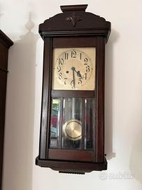 Orologio a pendolo antico