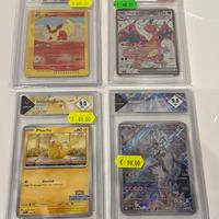 4 carte gradate pokemon charizard pikachu etc