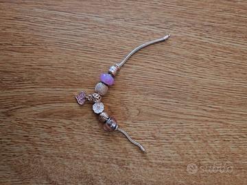 Bracciale con charms toni rosa/argento