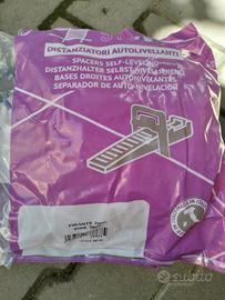 Distanziatori per piastrelle (cunei e tiranti)