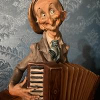 Statua Capodimonte firmata G. Armani.