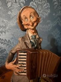 Statua Capodimonte firmata G. Armani.