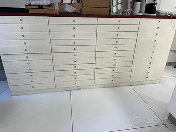 cassettiera negozio ottica