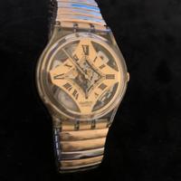 Swatch dorato anni 90 unisex