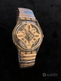Swatch dorato anni 90 unisex