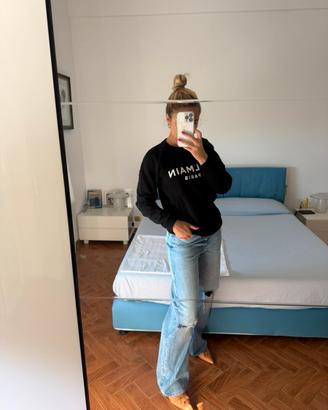 Jeans vita alta strappi sulle ginocchia